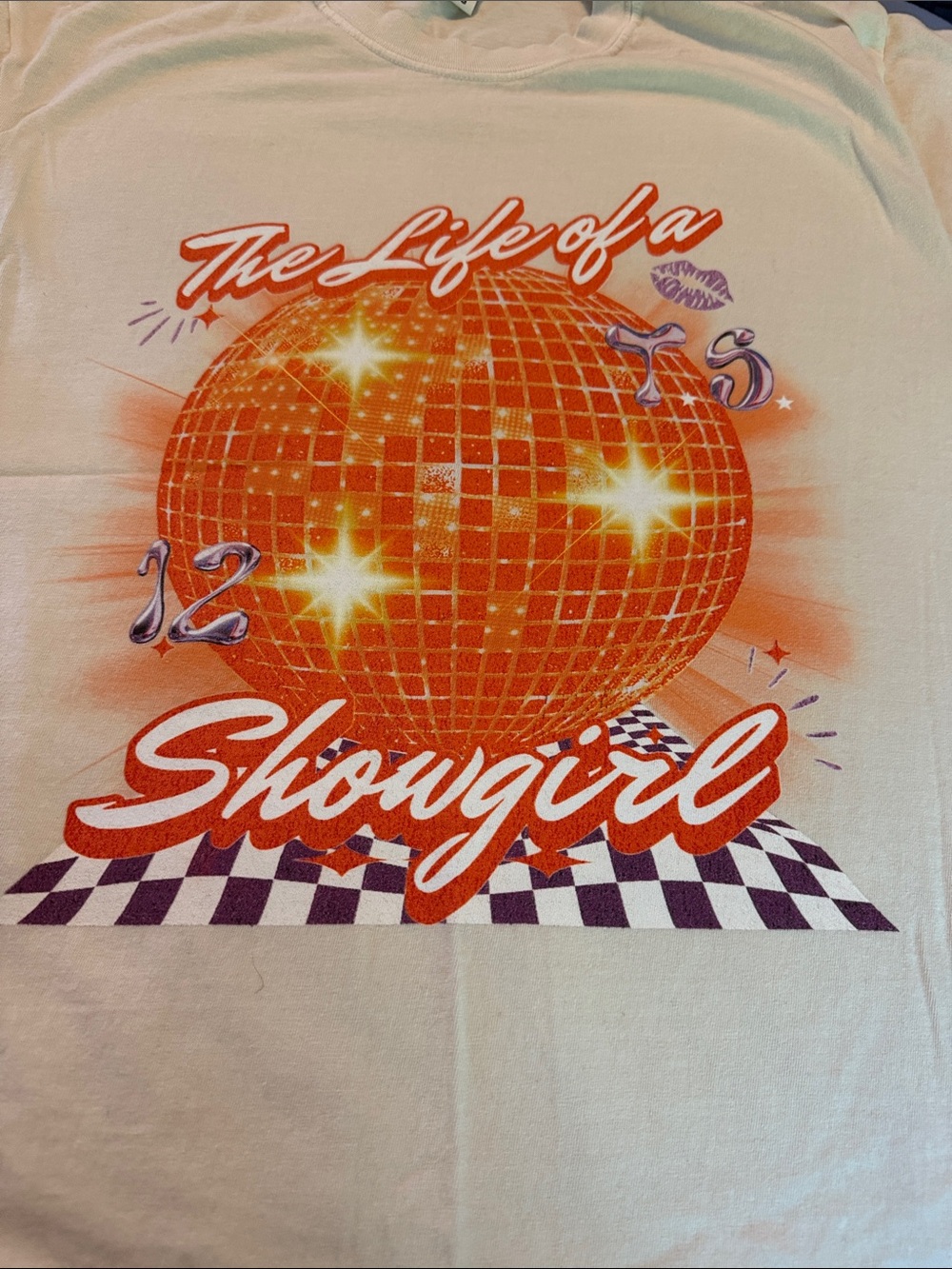 Taylor Swift “Life of a Showgirl' Graphic Tee with Orange Disco Print